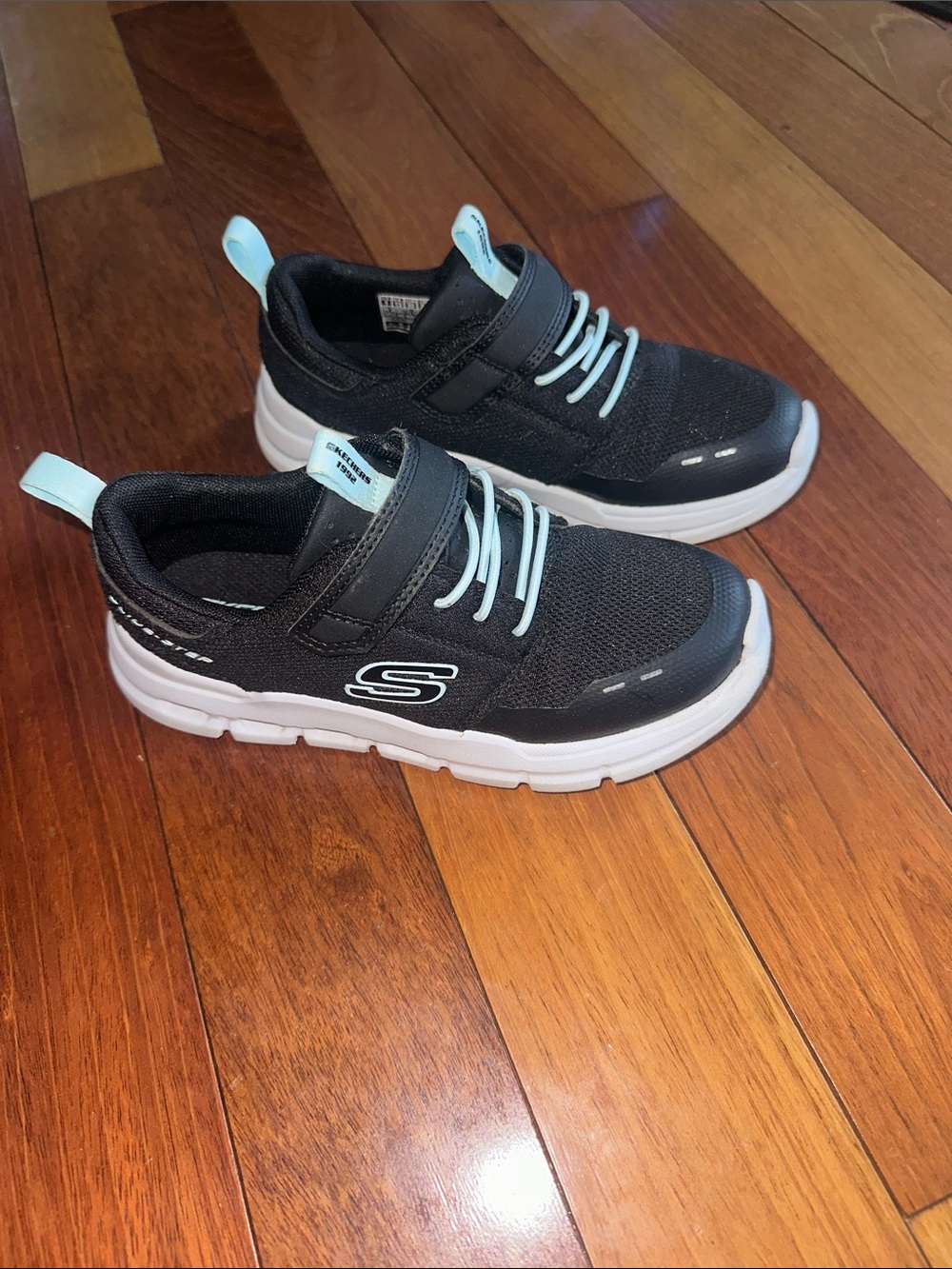 Skechers Kids Black Sneakers with Light Blue Accents